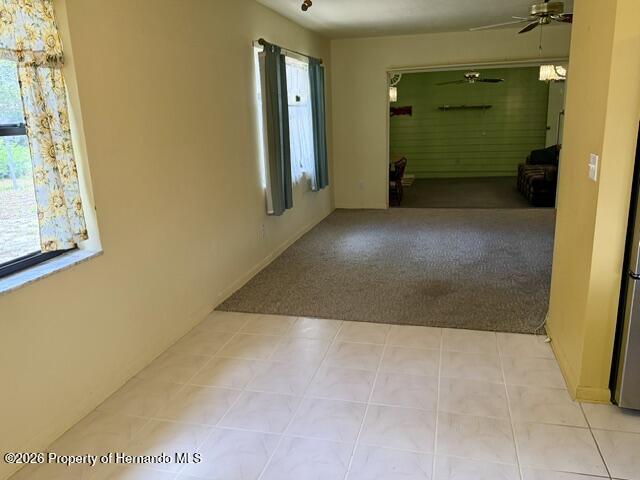 6848 Treehaven Drive Spring Hill, FL 34606 - Photo 16 of 34 View of living room from dining room