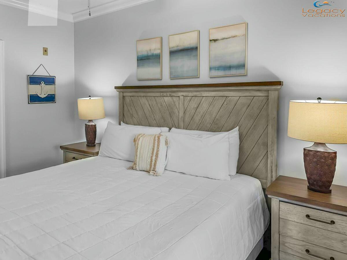 1150 Santa Rosa Boulevard, Unit 223 Fort Walton Beach, FL 32548 - Photo 16 of 53 a bedroom with a bed and window