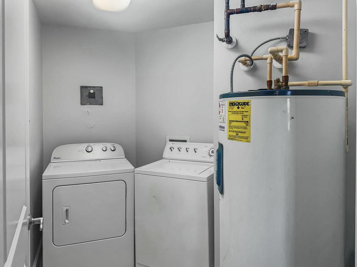 1150 Santa Rosa Boulevard, Unit 223 Fort Walton Beach, FL 32548 - Photo 27 of 53 a utility room with dryer and washer