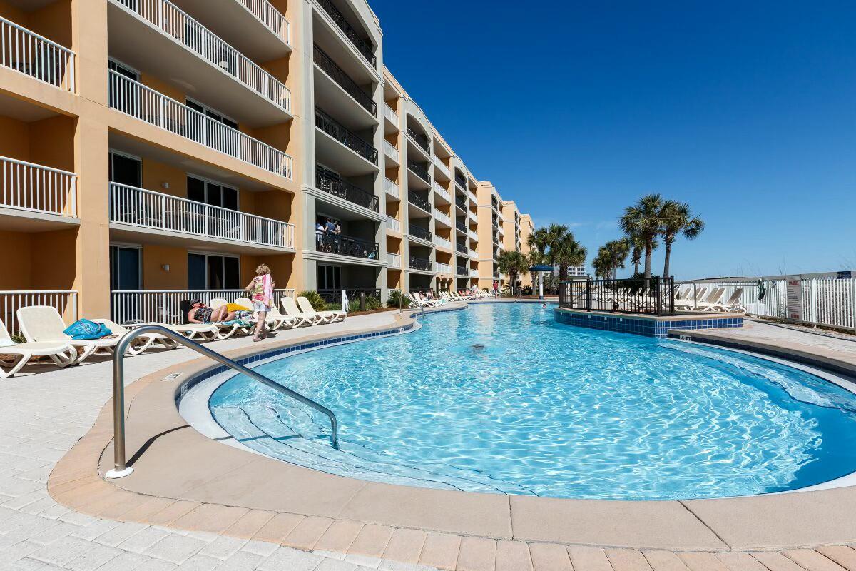 1150 Santa Rosa Boulevard, Unit 223 Fort Walton Beach, FL 32548 - Photo 40 of 53 a view of swimming pool with outdoor seating