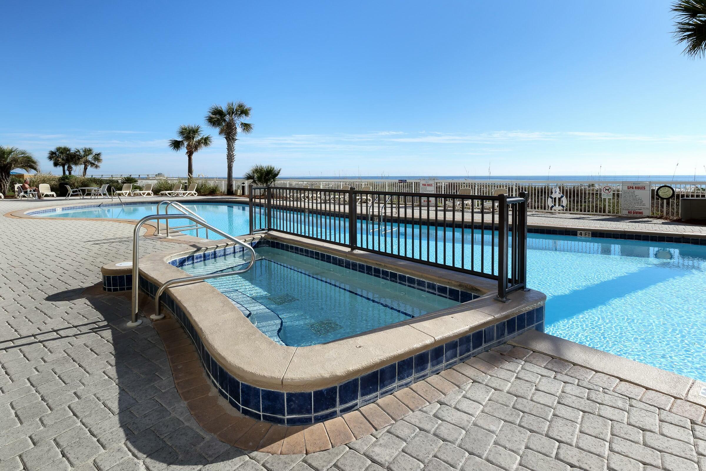 1150 Santa Rosa Boulevard, Unit 223 Fort Walton Beach, FL 32548 - Photo 42 of 53 a view of a swimming pool with a lounge chair