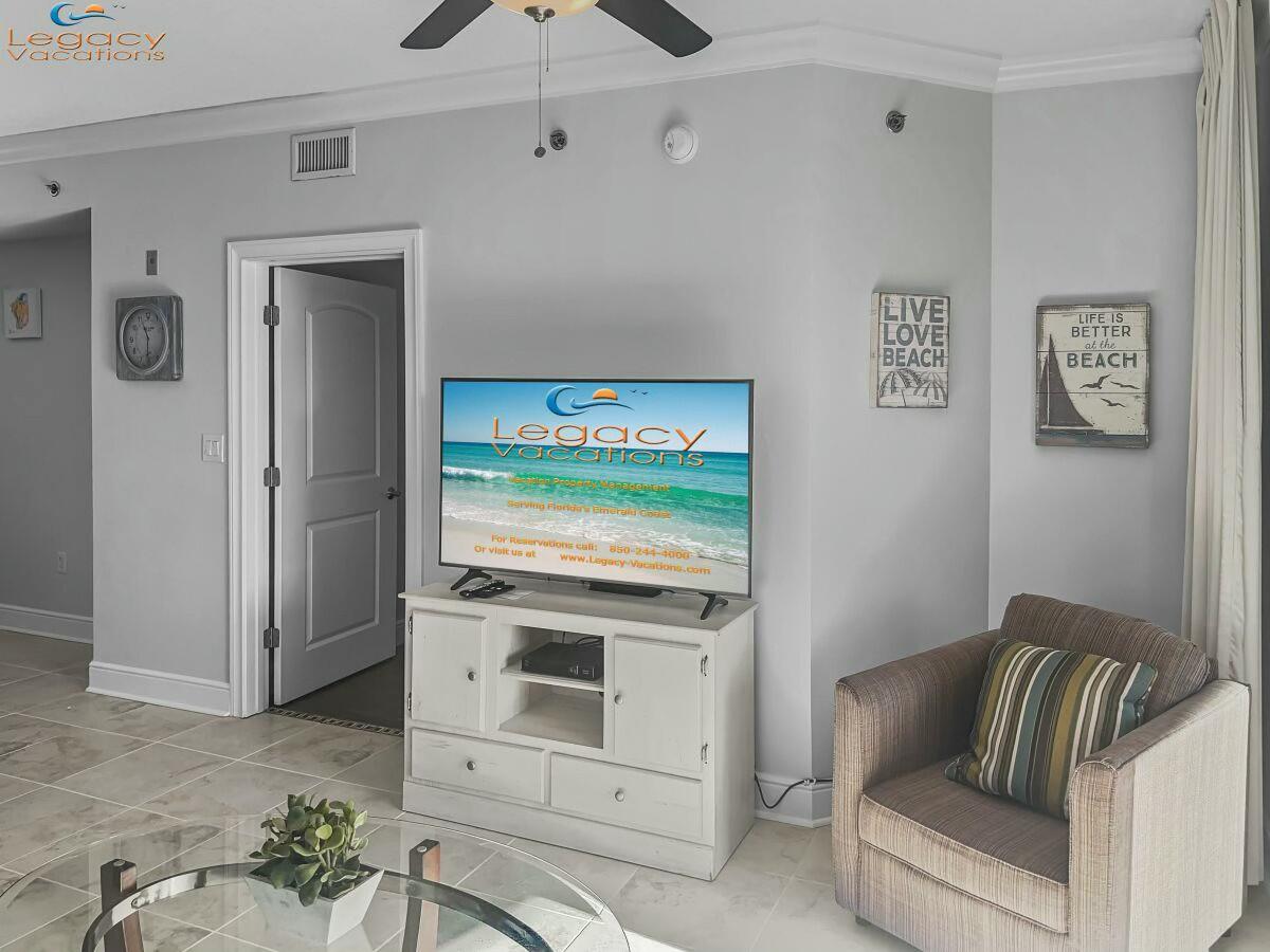 1150 Santa Rosa Boulevard, Unit 223 Fort Walton Beach, FL 32548 - Photo 9 of 53 a living room with stainless steel appliances kitchen island granite countertop furniture and a rug