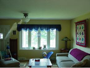 2516 Shutterlee Mill Road Staunton, VA 24401 - Photo 7 of 8 a living room with furniture and a window