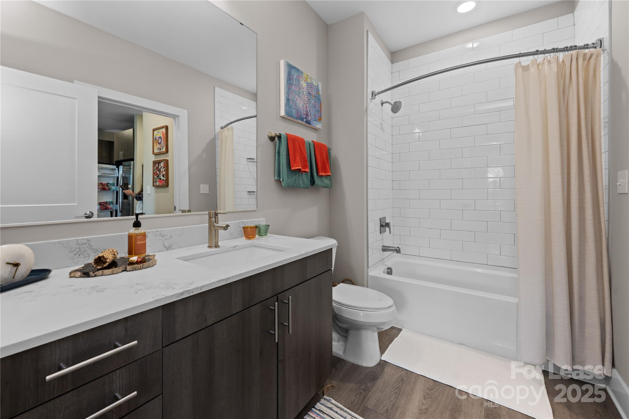 110 Razades Way, Unit B1 Charlotte, NC 28206 - Photo 13 of 29 a bathroom with a sink a toilet and shower