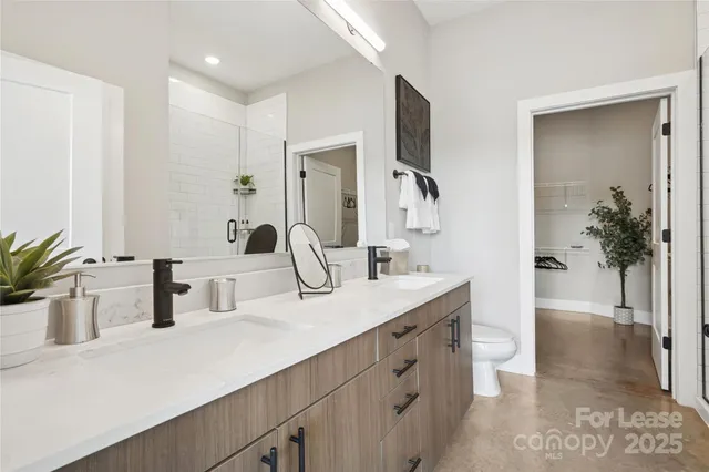a bathroom with sink and mirror