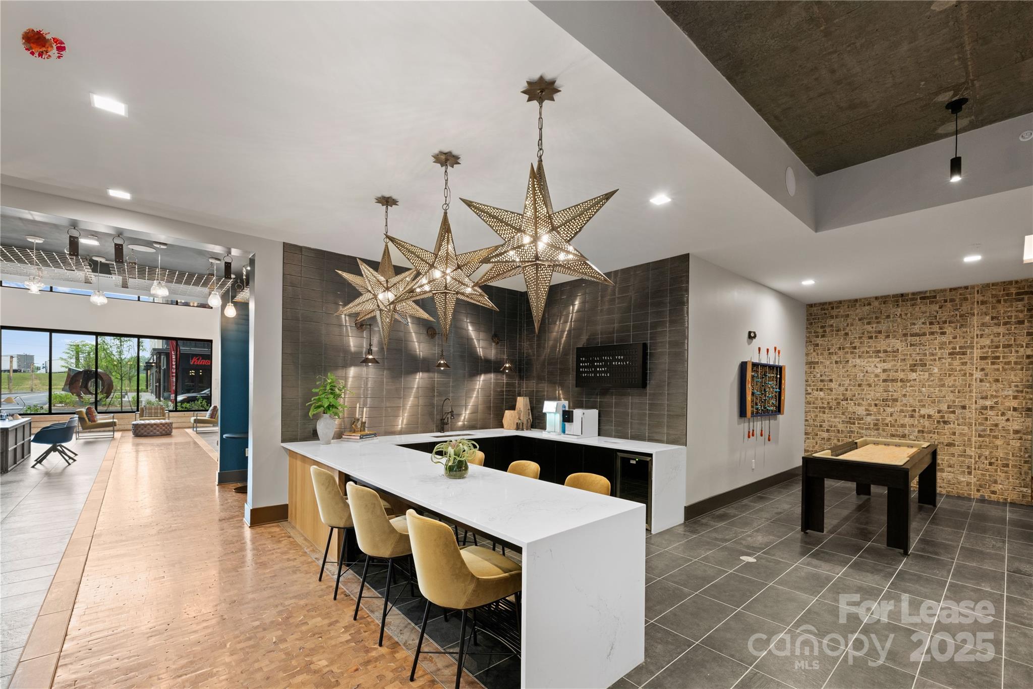 110 Razades Way, Unit B1 Charlotte, NC 28206 - Photo 3 of 29 a kitchen with stainless steel appliances kitchen island granite countertop a sink and a refrigerator