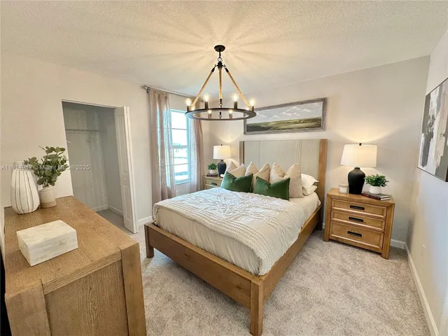 a bathroom with a toilet a sink and a bathtub