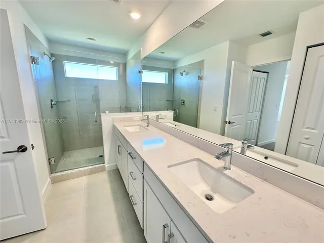 an empty room with a ceiling fan