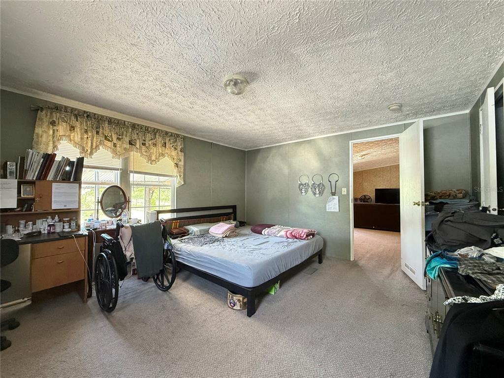 11101 Sumner Road Wimauma, FL 33598 - Photo 15 of 22 a living room with furniture and window