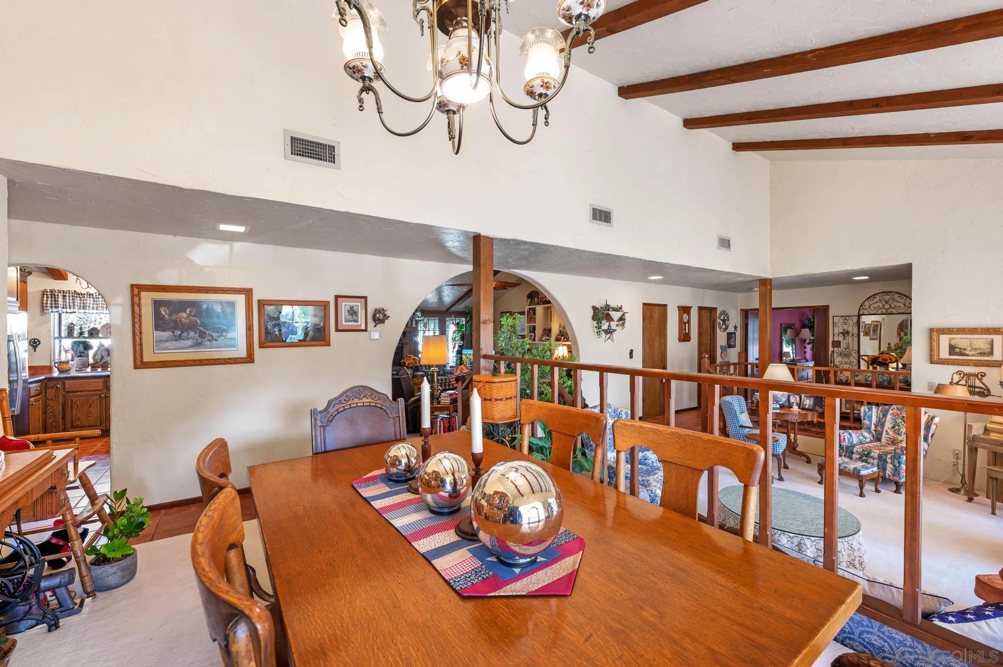 24572 Rutherford Road Ramona, CA 92065 - Photo 24 of 62 a living room with furniture and book shelf