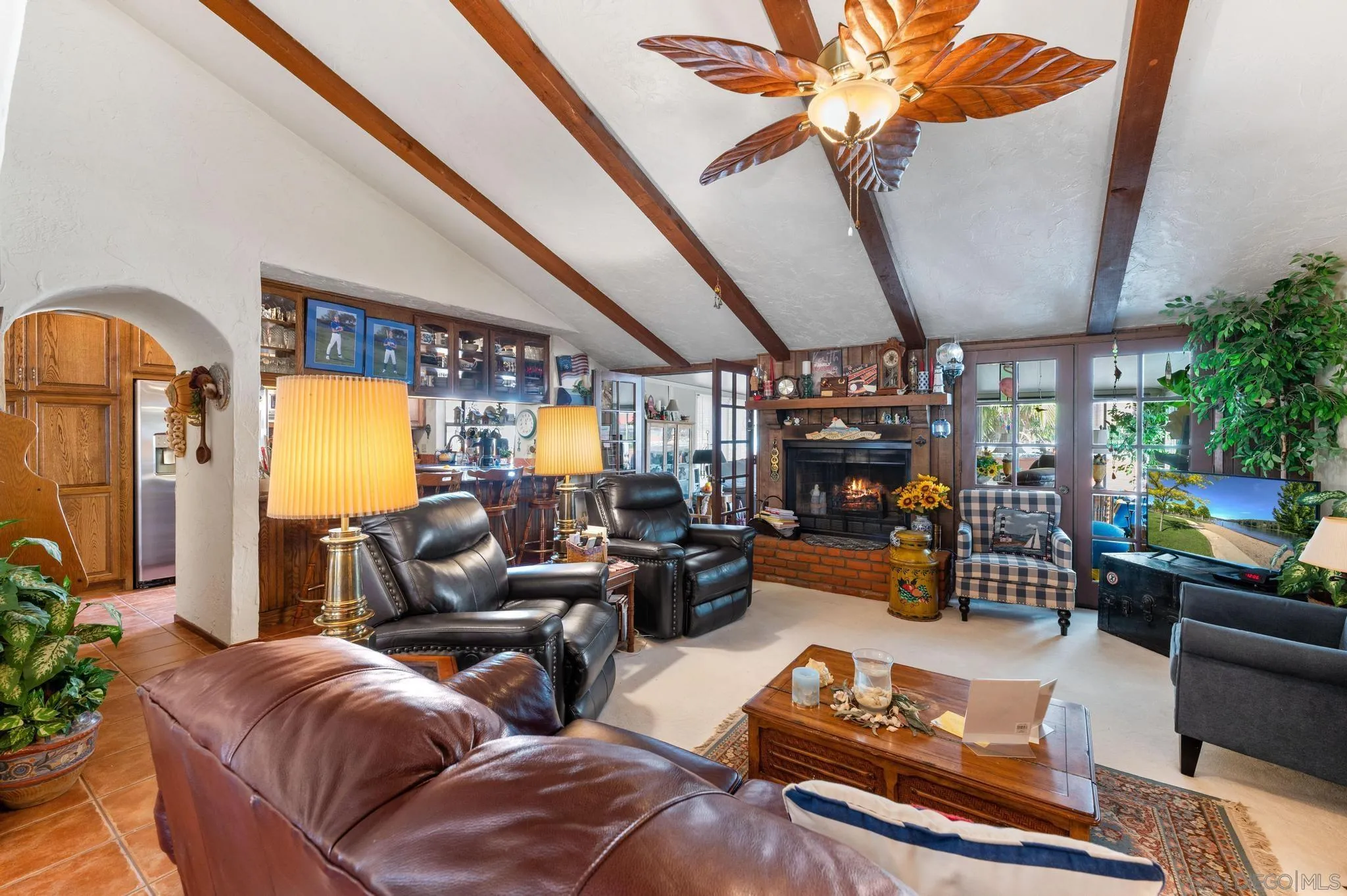 24572 Rutherford Road Ramona, CA 92065 - Photo 25 of 62 a living room with furniture and a chandelier