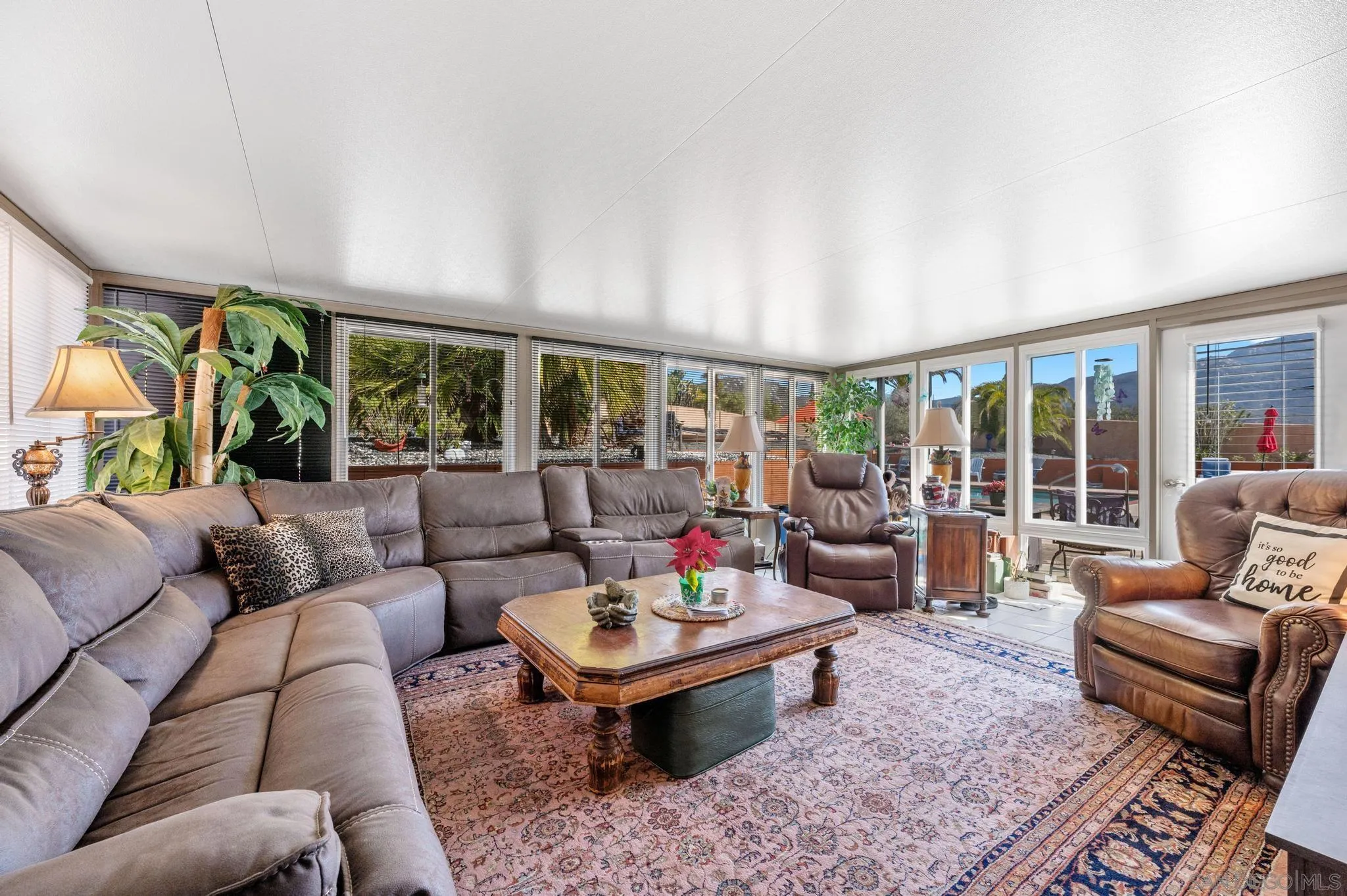 24572 Rutherford Road Ramona, CA 92065 - Photo 34 of 62 a living room with furniture and a large window