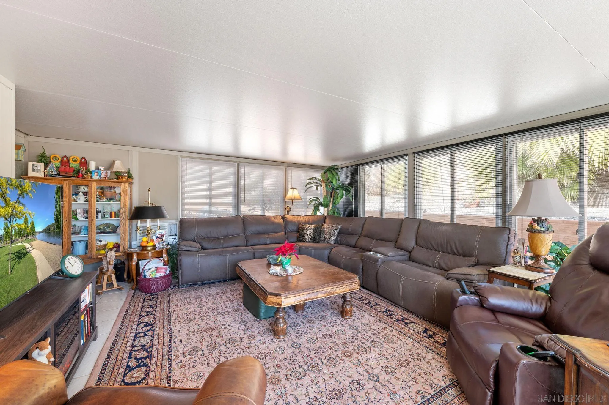 24572 Rutherford Road Ramona, CA 92065 - Photo 35 of 62 a living room with furniture and a window