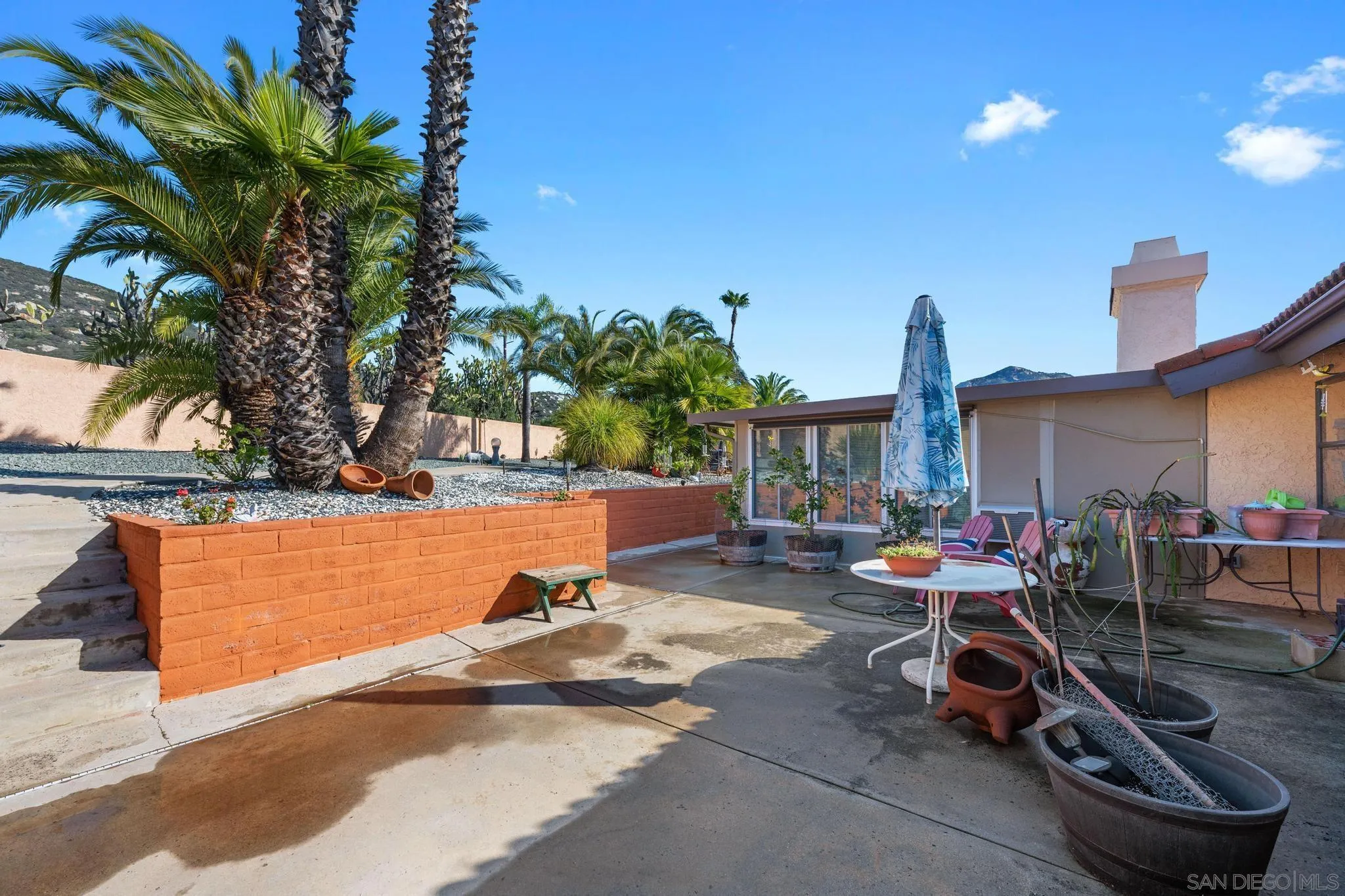 24572 Rutherford Road Ramona, CA 92065 - Photo 55 of 62 a view of a swimming pool with chairs
