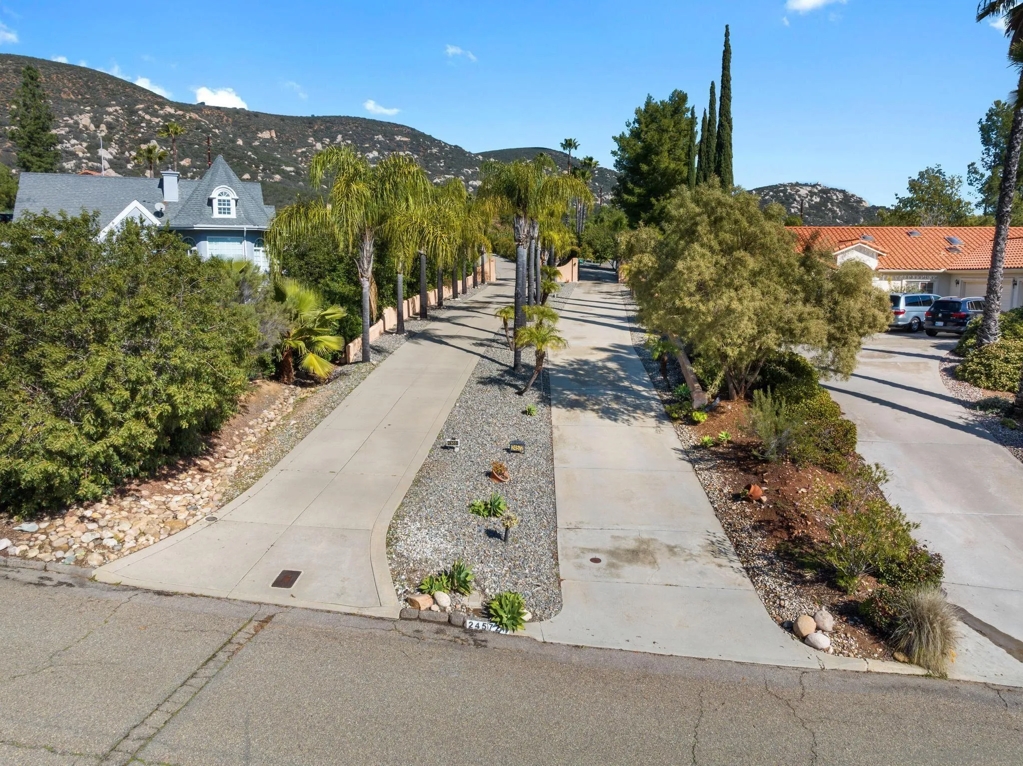 24572 Rutherford Road Ramona, CA 92065 - Photo 57 of 62 a view of a street with a houses