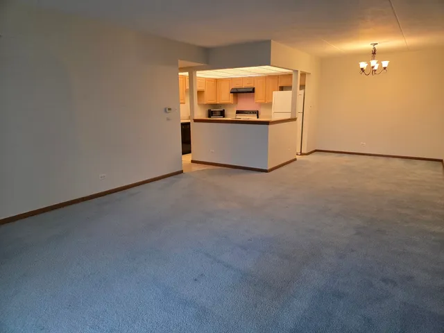 a view of a kitchen with a sink
