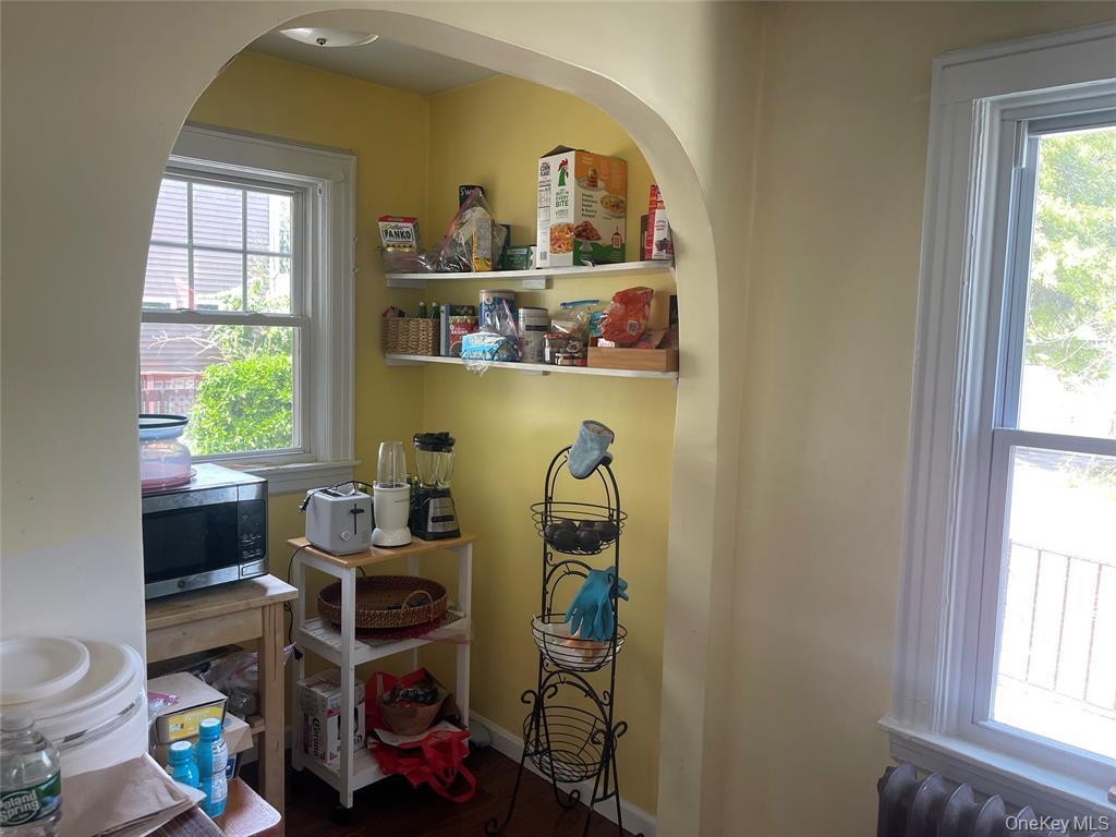 248-29 88th Road Queens, NY 11426 - Photo 3 of 20 a room with a window and gym equipment