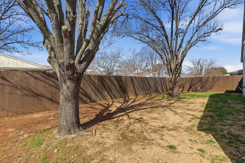 7733 Liz Lane Watauga, TX 76148 - Photo 23 of 27 View of fenced backyard
