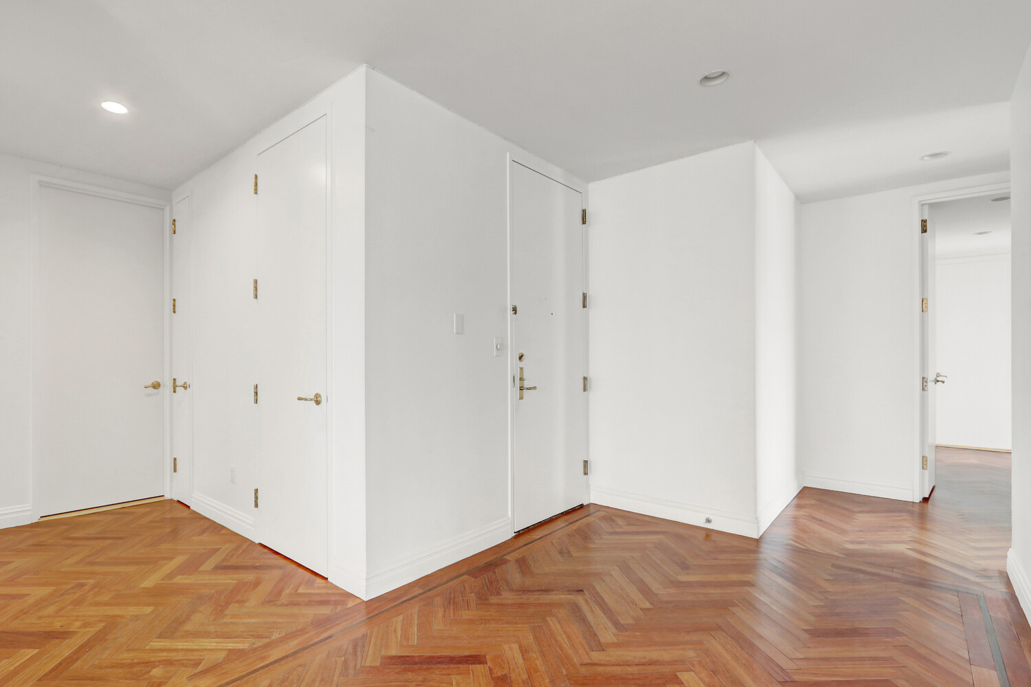 90 East End Avenue, Unit 10B Manhattan, NY 10028 - Photo 18 of 39 a view of a livingroom with wooden floor