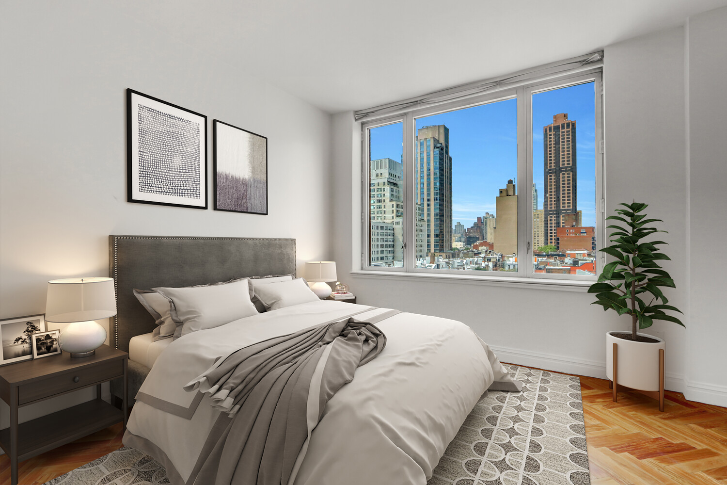 90 East End Avenue, Unit 10B Manhattan, NY 10028 - Photo 19 of 39 a bedroom with a large bed and a potted plant