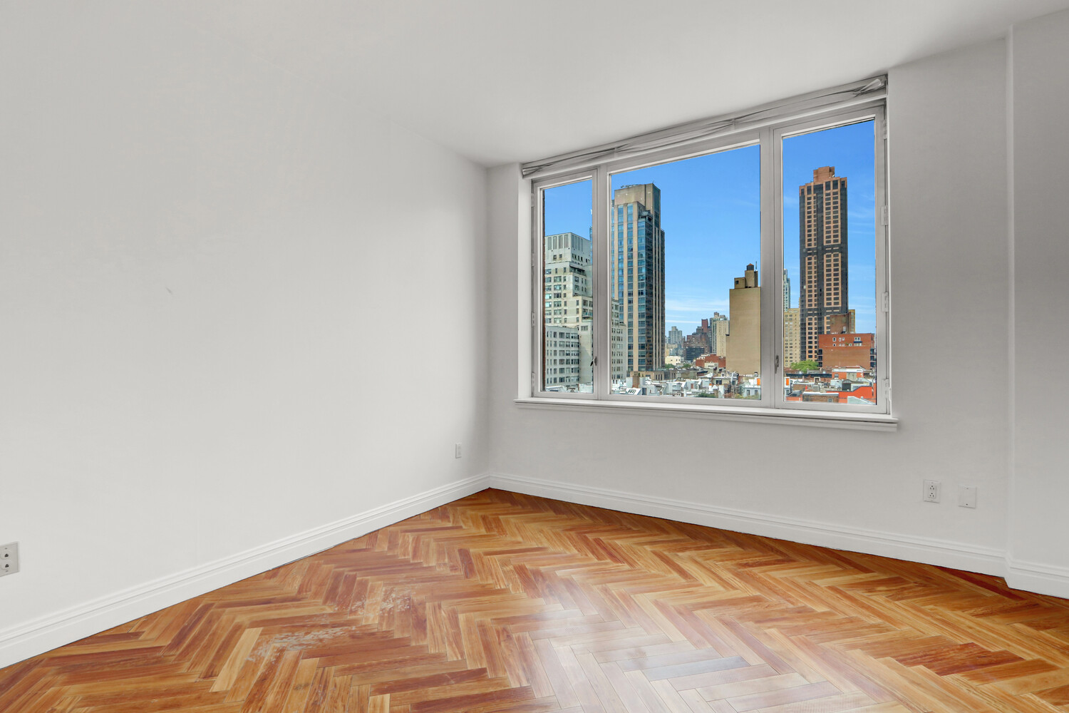 90 East End Avenue, Unit 10B Manhattan, NY 10028 - Photo 20 of 39 a view of a room with a large window