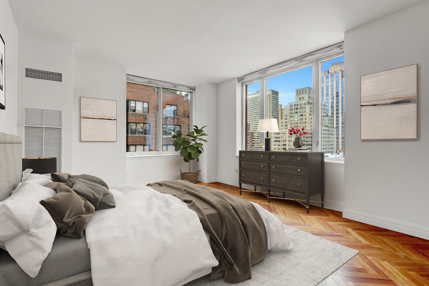90 East End Avenue, Unit 10B Manhattan, NY 10028 - Photo 23 of 39 a bedroom with bed and glass door