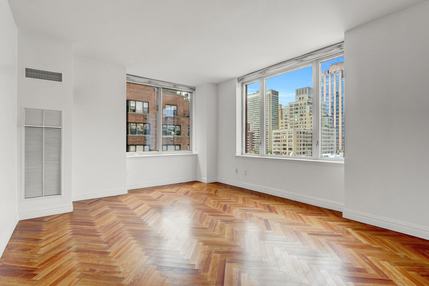 90 East End Avenue, Unit 10B Manhattan, NY 10028 - Photo 24 of 39 a view of an empty room with windows