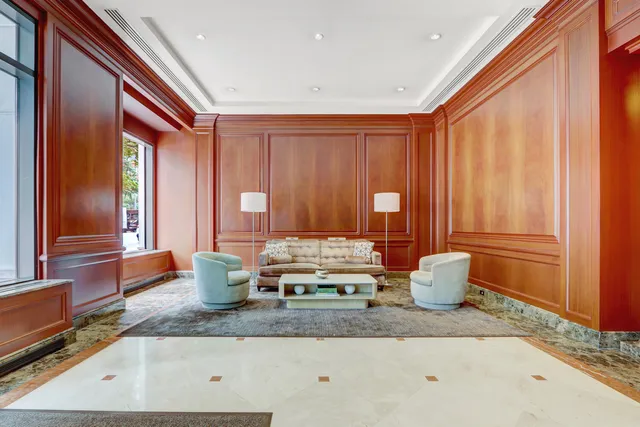 a kitchen with stainless steel appliances granite countertop a refrigerator and cabinets