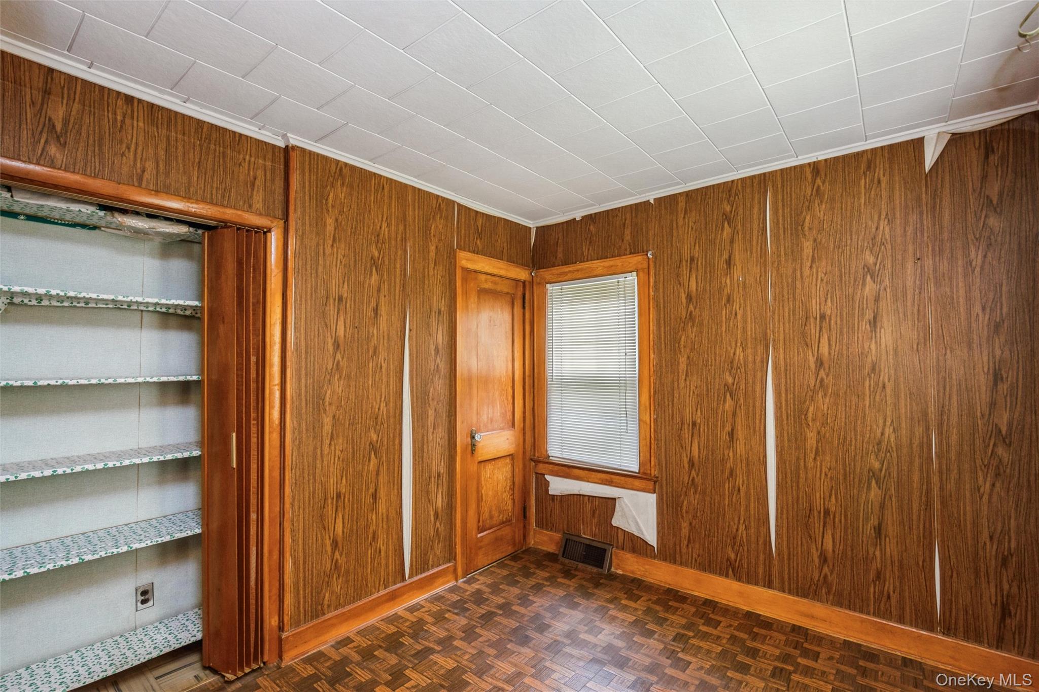 10 Laurel Road Ronkonkoma, NY 11779 - Photo 5 of 21 a view of an empty room and a window