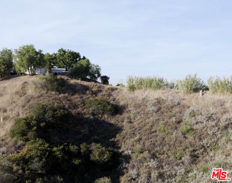 2300 Corsham Road Topanga, CA 90290 - Photo 1 of 13 a view of a field of grass and trees