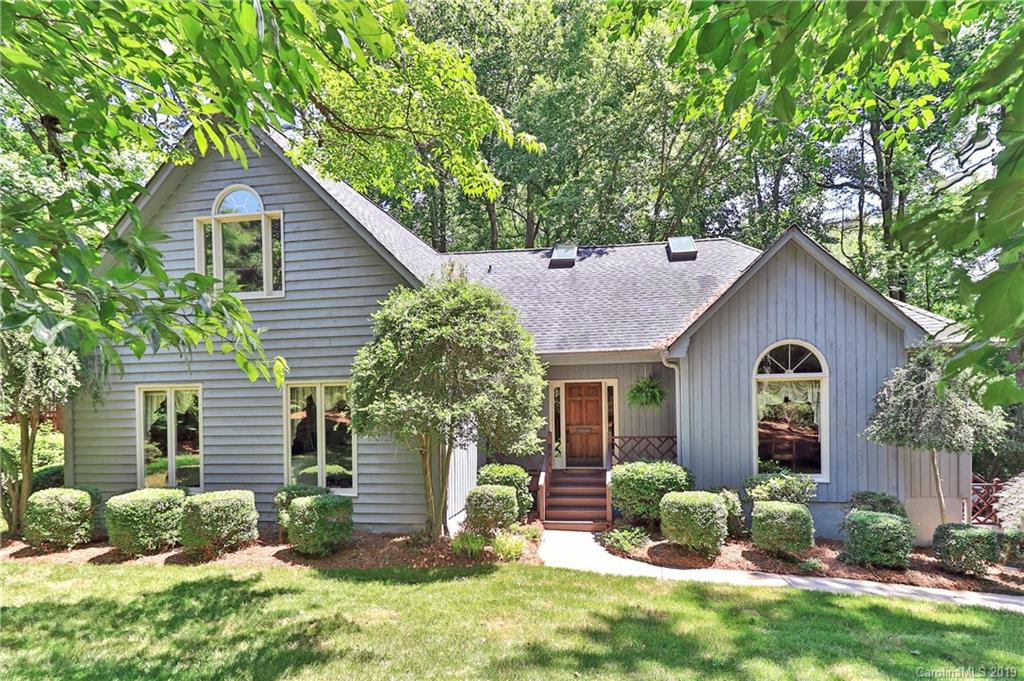 5123 Randolph Road Charlotte, NC 28211 - Photo 1 of 28 a front view of a house with yard and green space