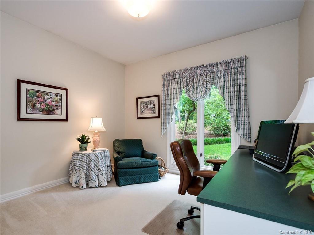 5123 Randolph Road Charlotte, NC 28211 - Photo 18 of 28 a view of a livingroom with workspace and a window
