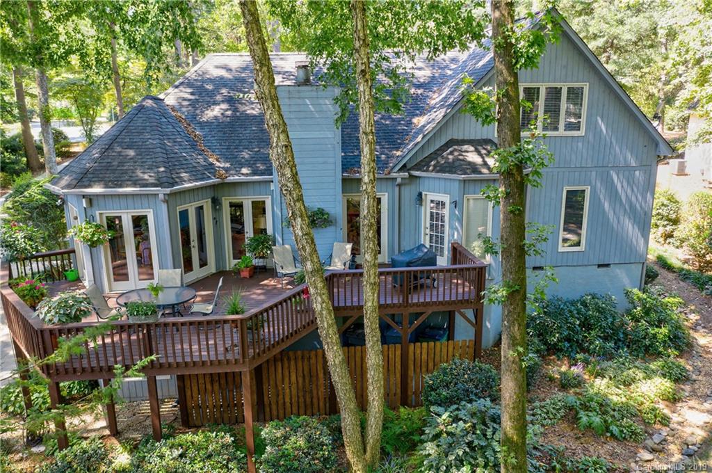 5123 Randolph Road Charlotte, NC 28211 - Photo 23 of 28 a front view of a house with balcony and garden