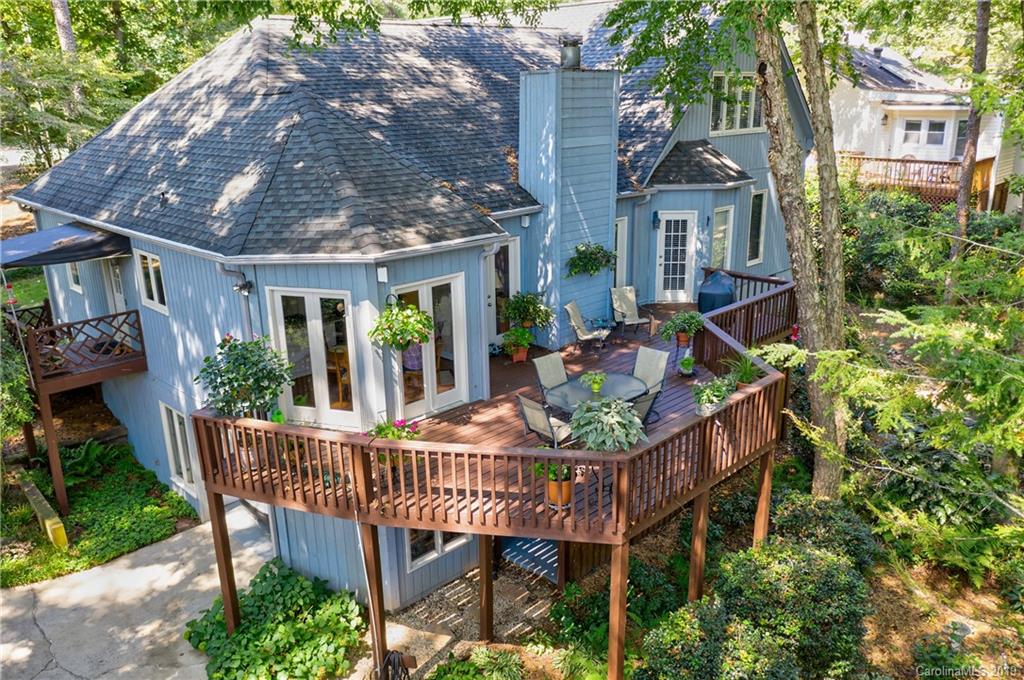 5123 Randolph Road Charlotte, NC 28211 - Photo 24 of 28 a view of a chair and table in the patio in front of house