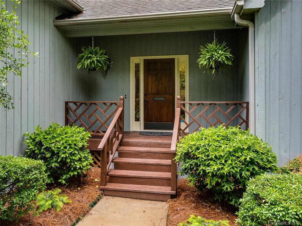 5123 Randolph Road Charlotte, NC 28211 - Photo 4 of 28 a view of a entryway with flower pots