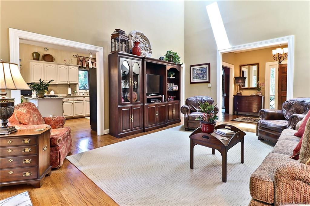 5123 Randolph Road Charlotte, NC 28211 - Photo 7 of 28 a living room with furniture a window and a flat screen tv