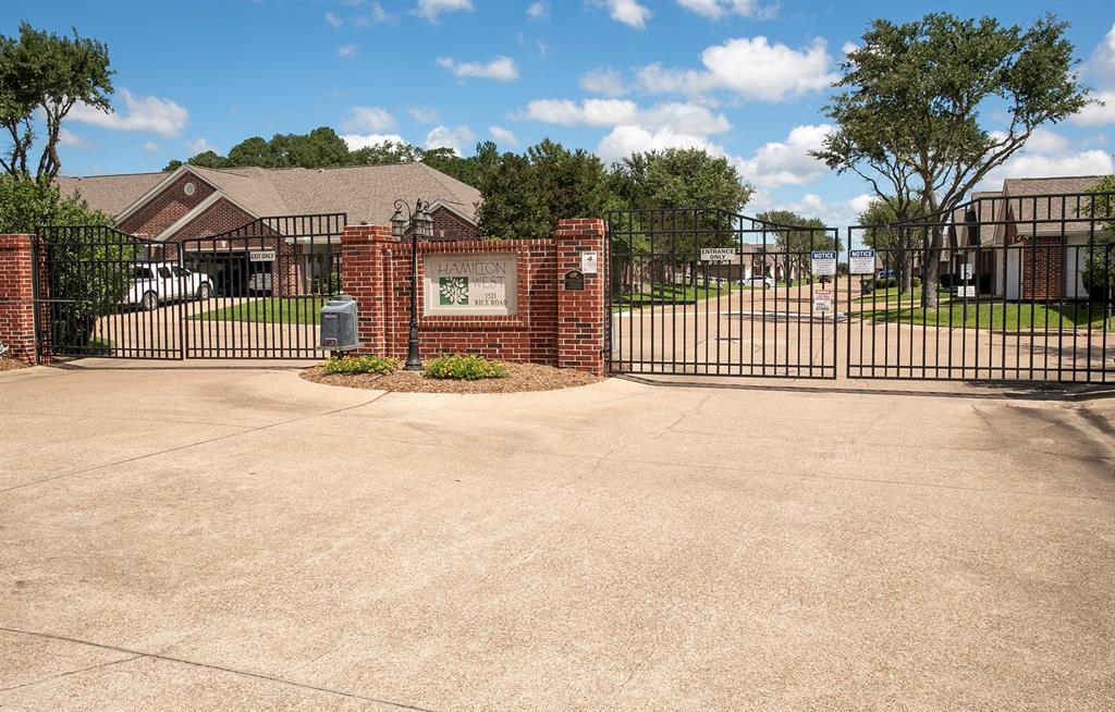 1521 Rice Road, Unit E105 Tyler, TX 75703 - Photo 29 of 29 a view of a street with a large trees