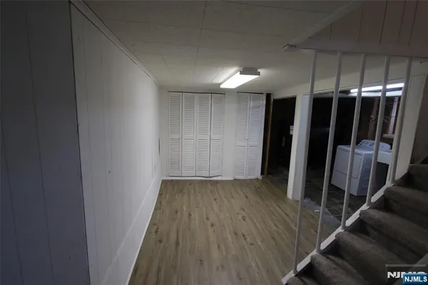 a view of hallway with stairs