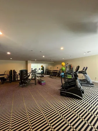 a view of a room with gym equipment
