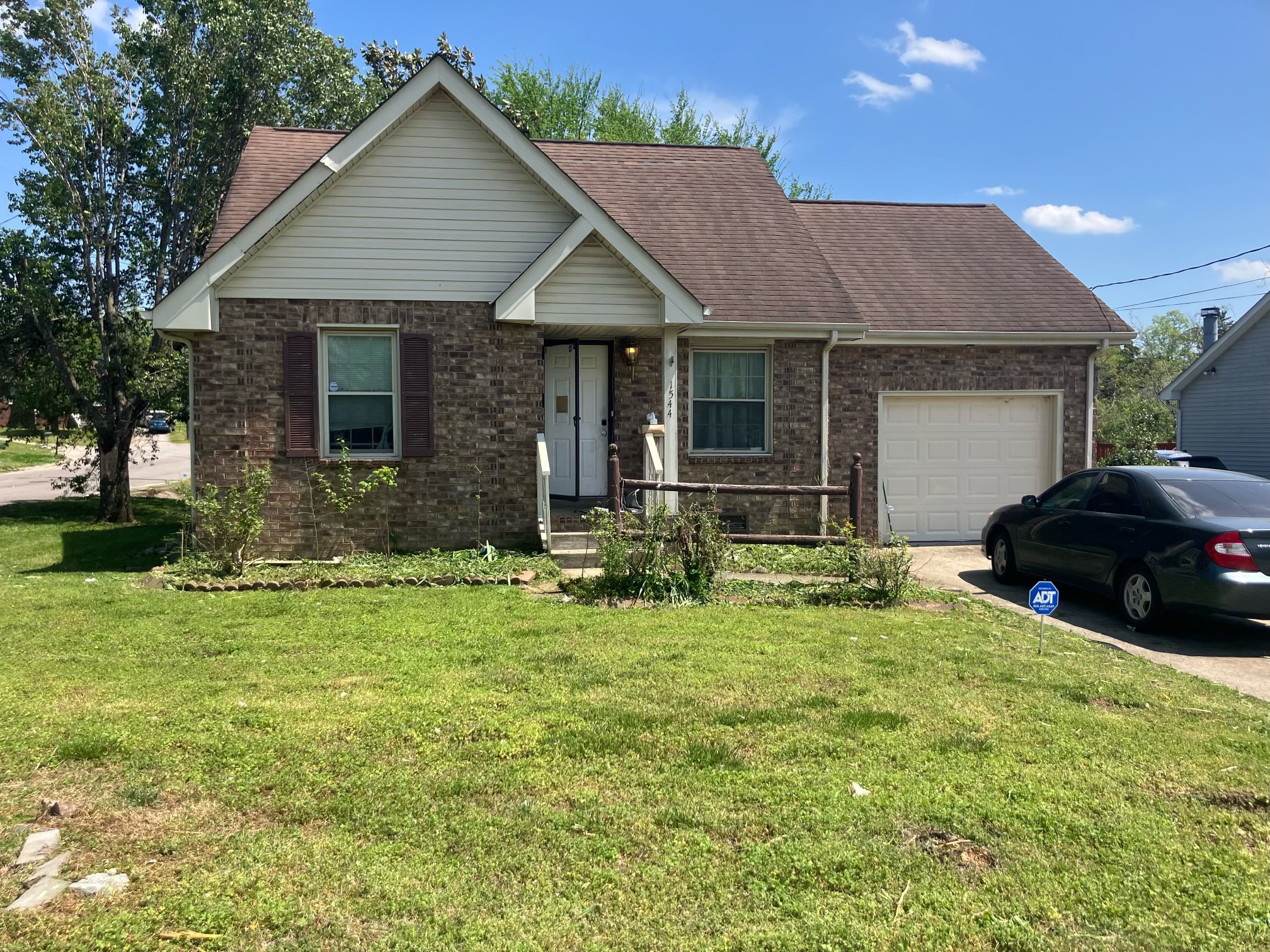 a house view with a garden space
