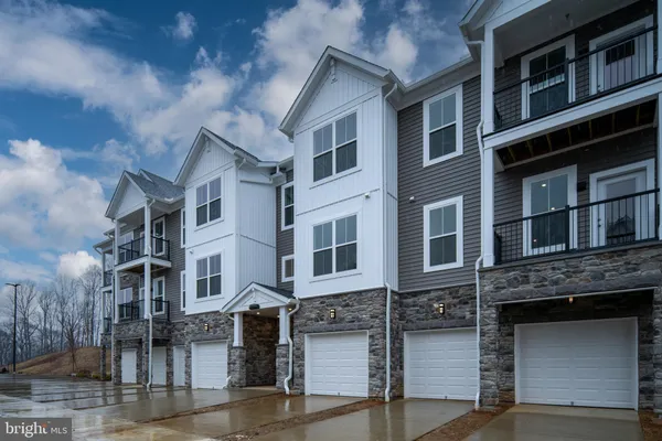 a front view of a multi story building