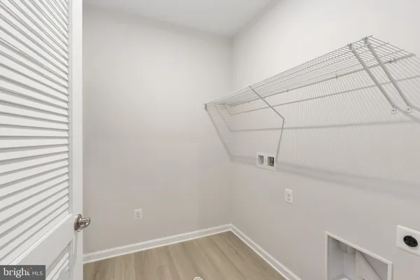 a view of a room with racks on the wall