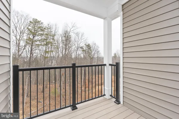 a view of a wooden fence