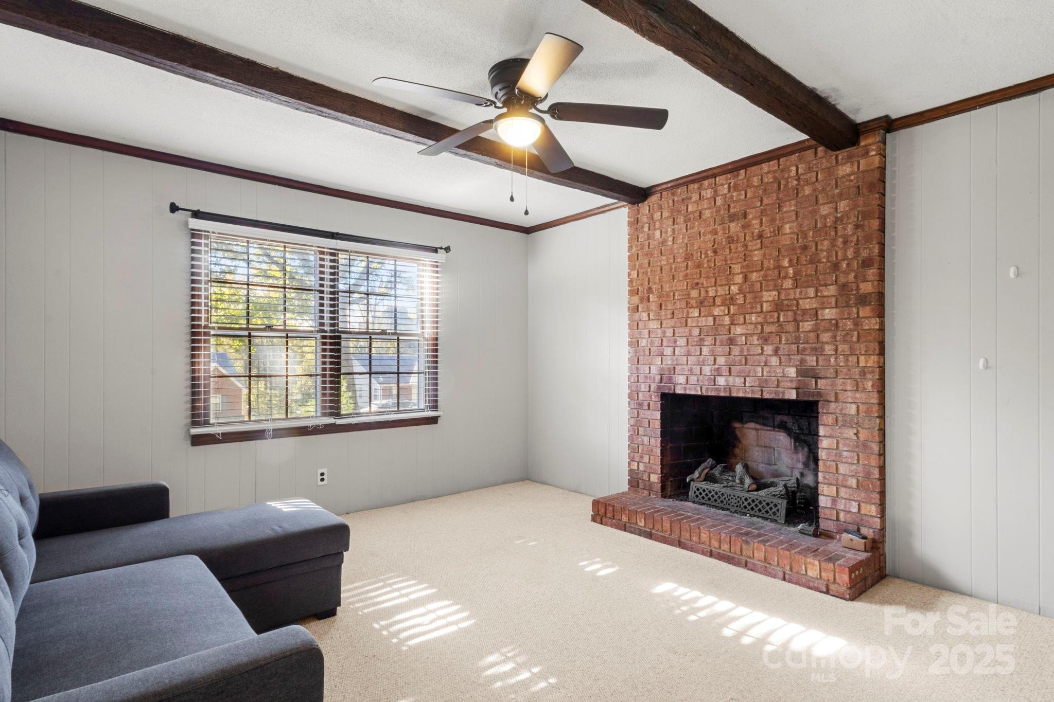 893 Ragin Lane Rock Hill, SC 29732 - Photo 14 of 29 a living room with furniture and a fireplace
