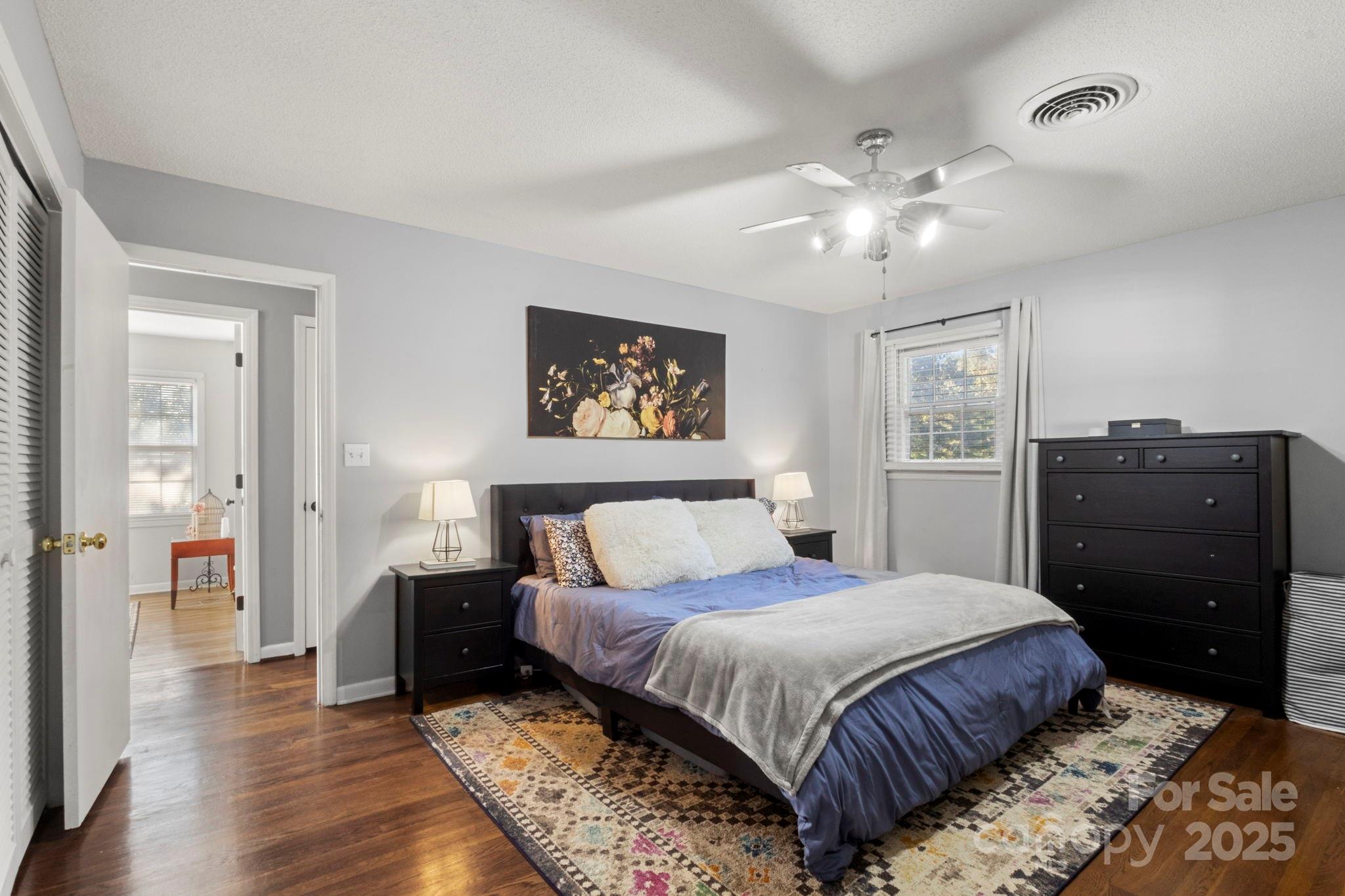 893 Ragin Lane Rock Hill, SC 29732 - Photo 17 of 29 a bedroom with bed and wooden floor
