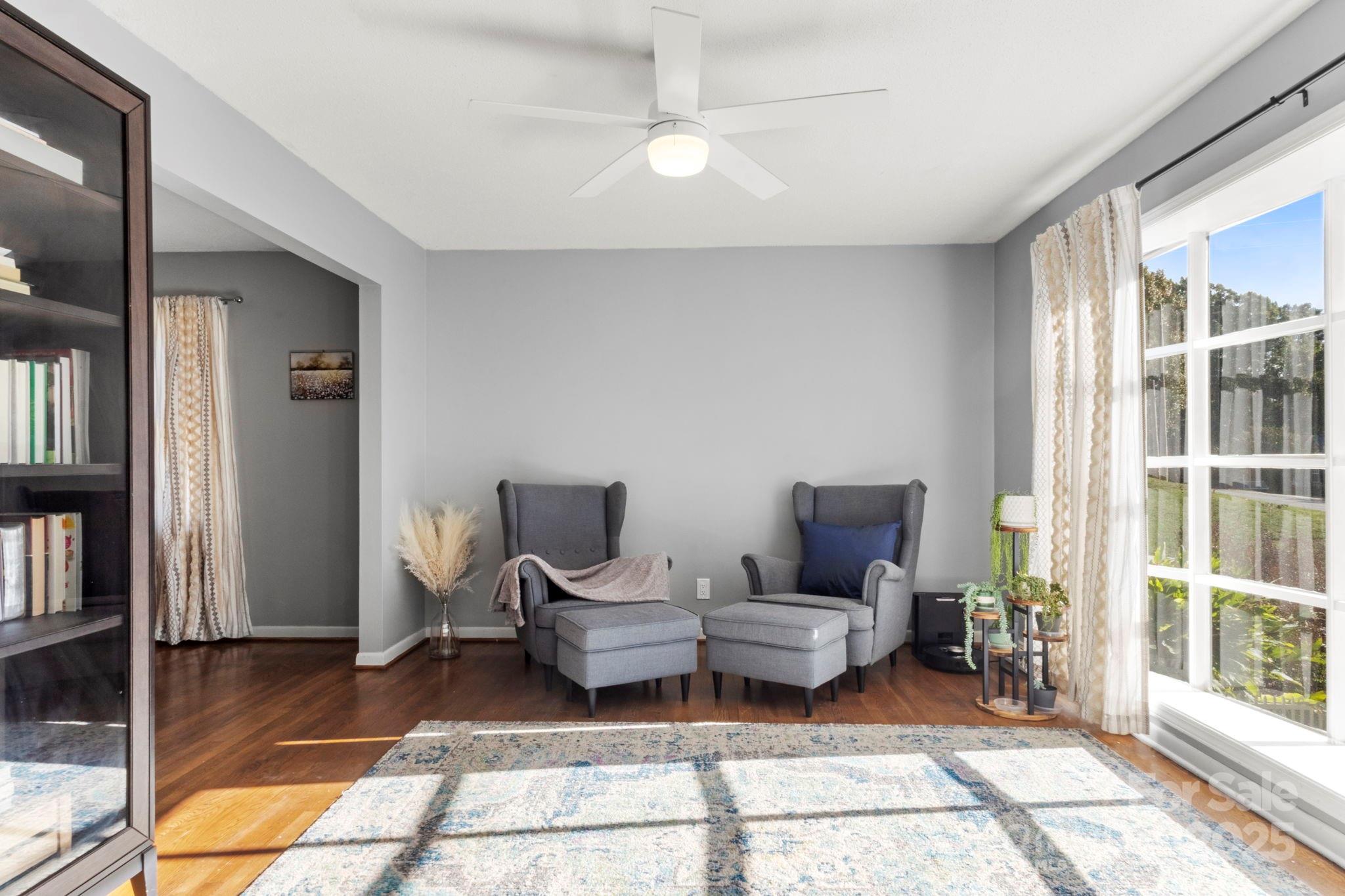 893 Ragin Lane Rock Hill, SC 29732 - Photo 3 of 29 a living room with furniture a rug and a large window