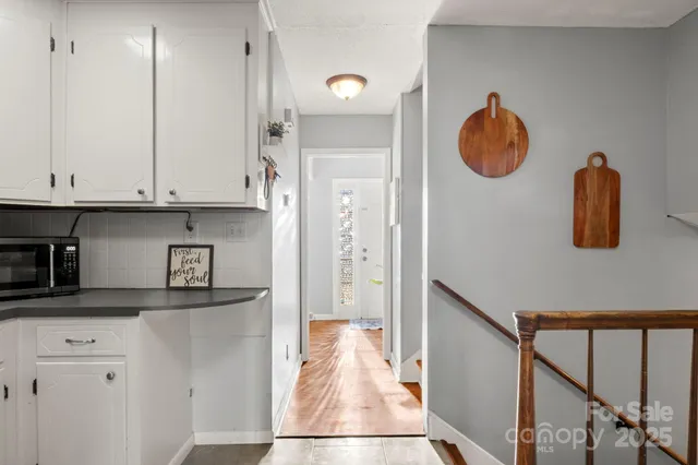 a view of cabinets and wooden floor