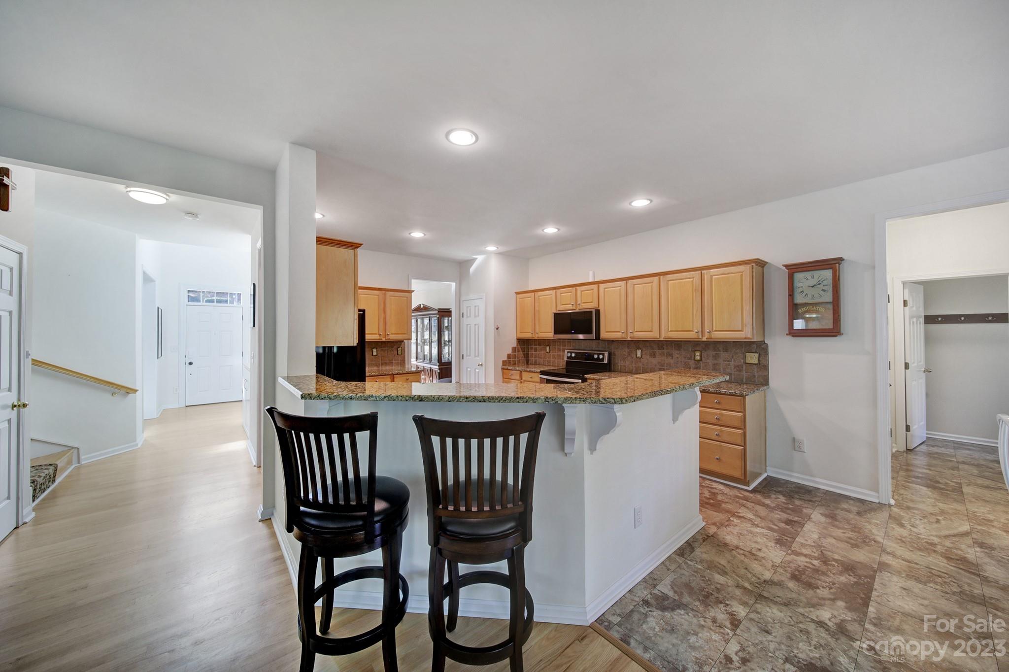 701 Drew Avenue Fort Mill, SC 29708 - Photo 6 of 37 a kitchen with a table and chairs in it