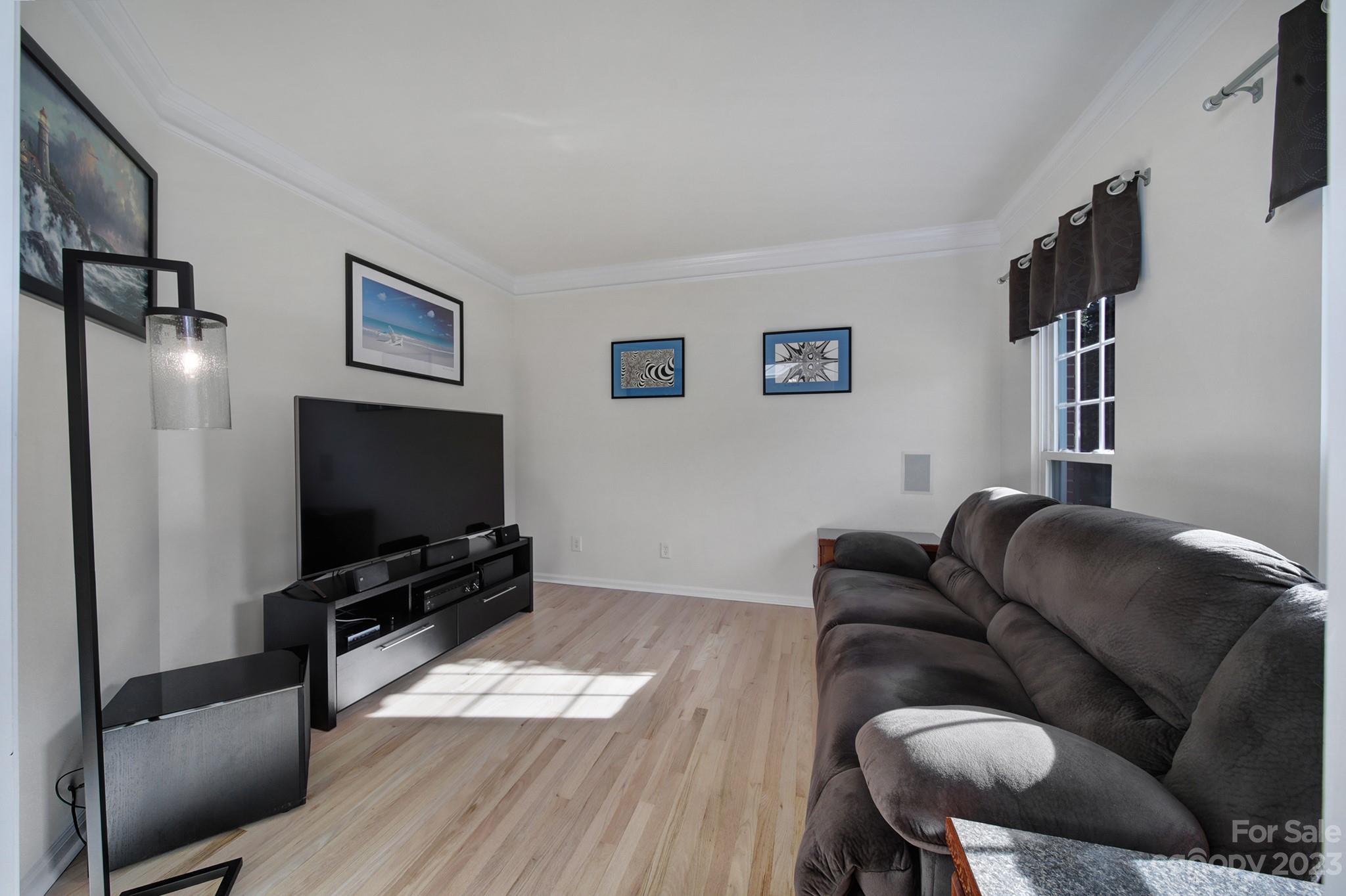 701 Drew Avenue Fort Mill, SC 29708 - Photo 7 of 37 a living room with furniture and a flat screen tv