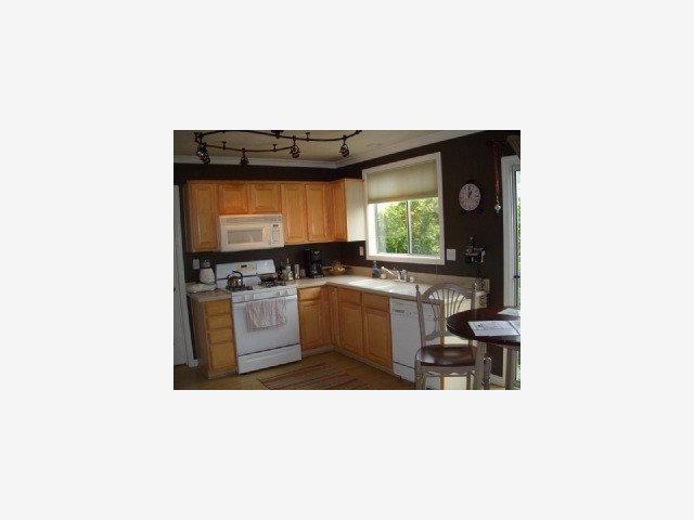 3308 Axford Road Santa Cruz, CA 95062 - Photo 7 of 9 a kitchen with a sink cabinets and window